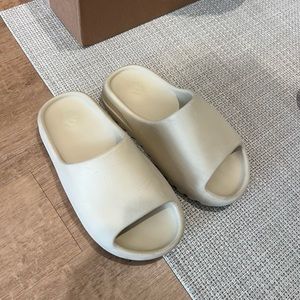 Yeezy slides in bone
